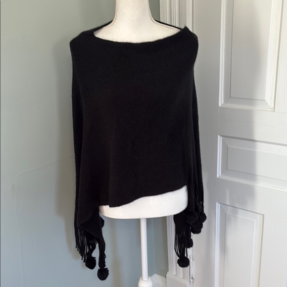 Elegant Black Knit Poncho Sweater with Fringe Details - Picture 1 of 3